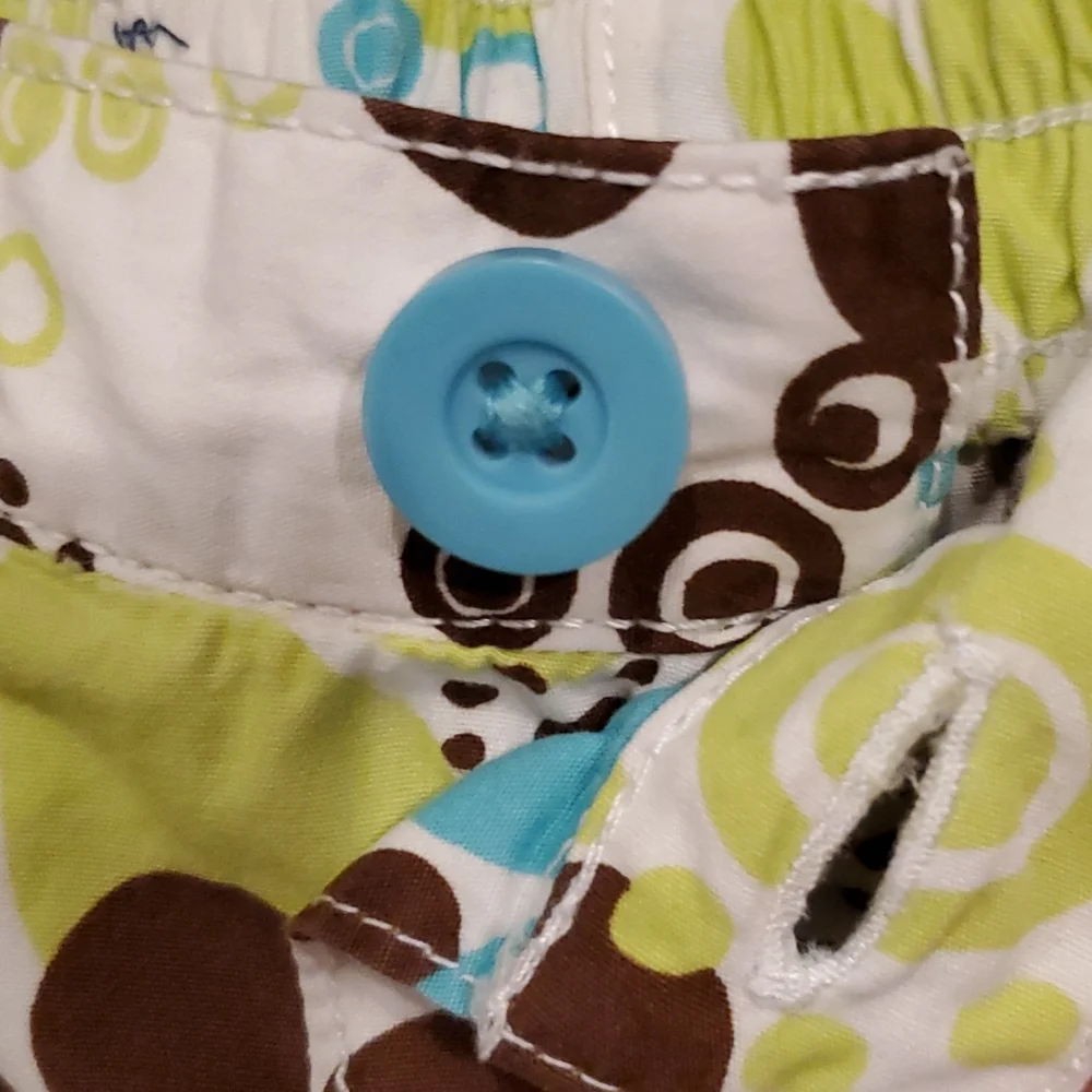 Girls Carter's brown, lime, & blue floral shorts size 24M